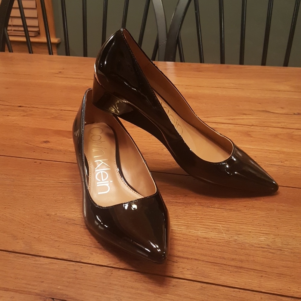 New in box Calvin Klein black patent low wedges